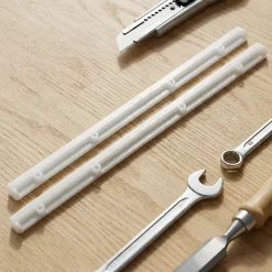 2 coulisses Plastique L. 268 mm x H. 15 mm x EP. 11mm