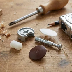 2 ferrures d'assemblage + Goujon ø25 x H. 12 mm
