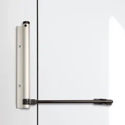 Bras à ressort ferme porte, a corps très fin en Aluminium anodisé argent