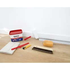 Colle pour revêtements lisses de rénovations lourds (jusqu'à 750g/m²) Quelyd pâte 1kg