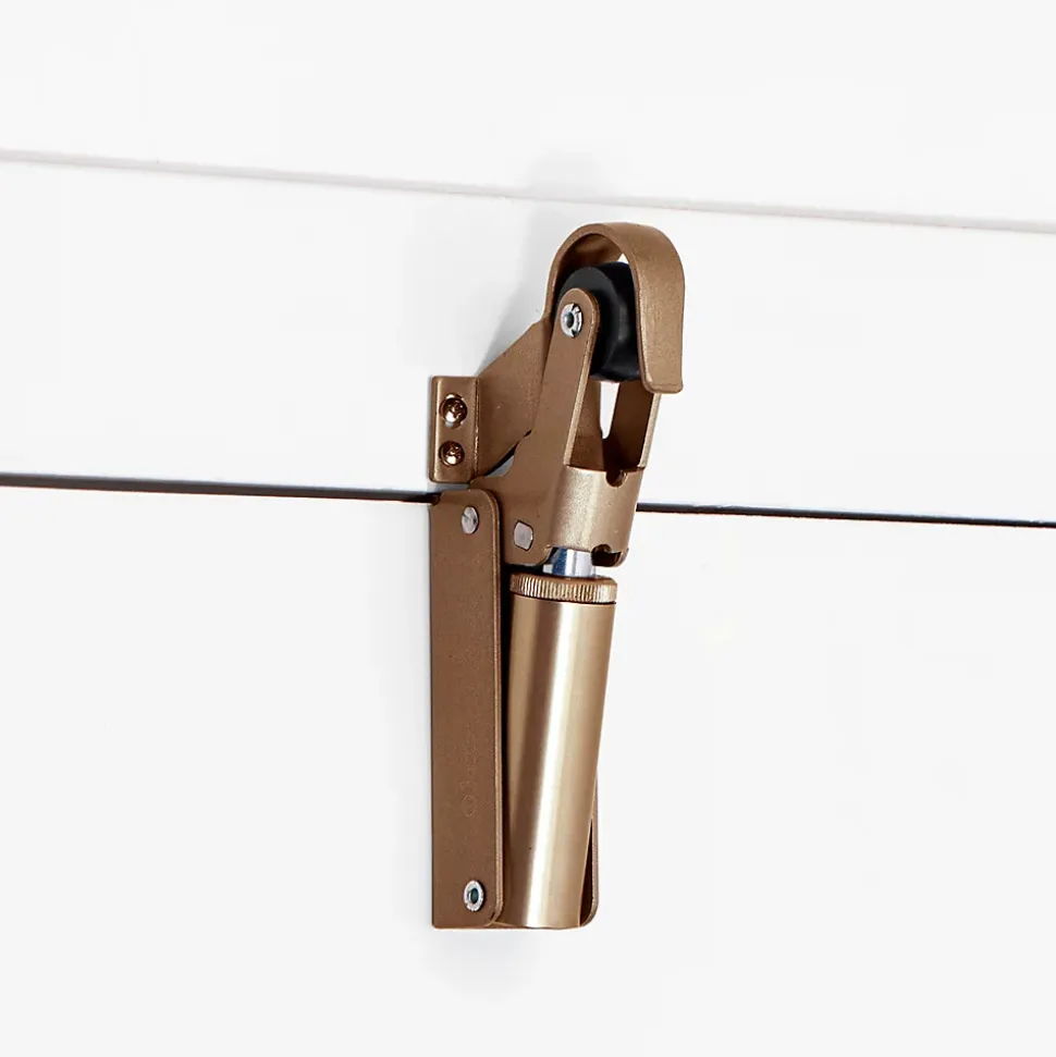 Frein de rétention force 115 N, en aluminium anodisé bronze, pour porte jusquà 100 KG.