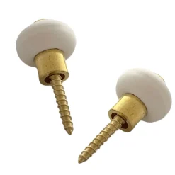 Lot de 2 butoirs sol en zamak laitonné avec vis. Diamètre 30mm, hauteur 30mm. Bague amortisseur en élastomère blanc (caoutchouc).