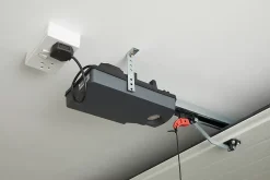 Motorisation pour porte de garage sectionnelle