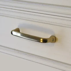 Poignée de meuble nœud GoodHome Tudy Laiton effet laiton doré l.110mm x H. 15mm entraxe 96mm