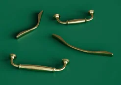 Poignée de meuble nœud GoodHome Ruis effet laiton doré l.148mm x l.20mm x H. 38mm entraxe 128mm