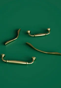 Poignée de meuble nœud GoodHome Ruis effet laiton doré l.148mm x l.20mm x H. 38mm entraxe 128mm