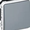 Poussoir lumineux bascule inverseur saillie Plexo gris Legrand
